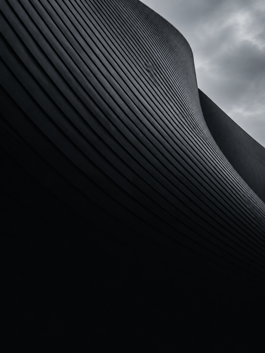 Dark curved architecture with fine ribbed surfaces